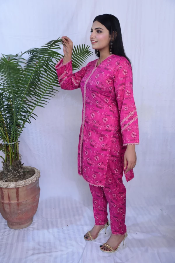 Girl in beautiful printed lawn dress in Pink