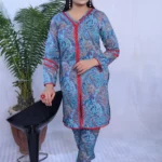 A women wearing printed two pieces stitched lawn in blue