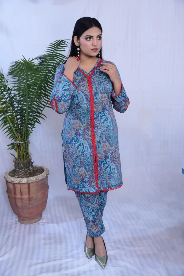 Girl in beautiful printed lawn dress in blue
