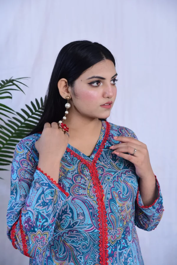 Girl in beautiful printed lawn dress in blue
