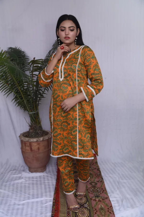 Two piece stitched printed floral yellow suit for women