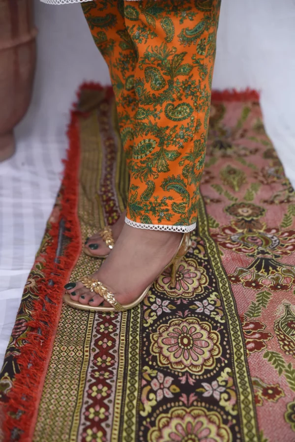 A women in printed yellow floral design dress